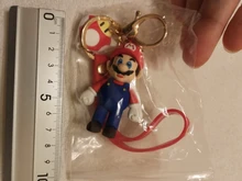 LLavero de dibujos animados de personajes de Super Mary, llavero de muñeca de modelado de animación, joyería portátil exquisita, colgante, venta al por mayor