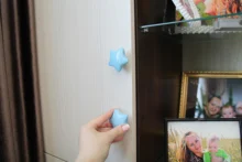 NAIERDI-perilla cerámica para gabinete de habitación de niños, tirador de armario con diseño de dibujos animados, luna y estrella, manijas para puerta de jardín