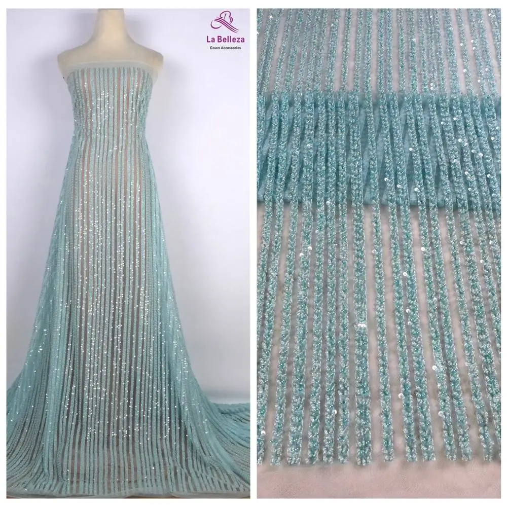 Кружевная ткань для свадебного платья La mejor, голубая, простая линия, супер тяжелая, ручная работа, бисер, 1 ярд, Ширина 51 дюйма
Кружевная ткань для свадебного платья La mejor, голубая, простая линия, супер тяжелая, ручная работа, бисер, 1 ярд, Ширина 51 дюйма