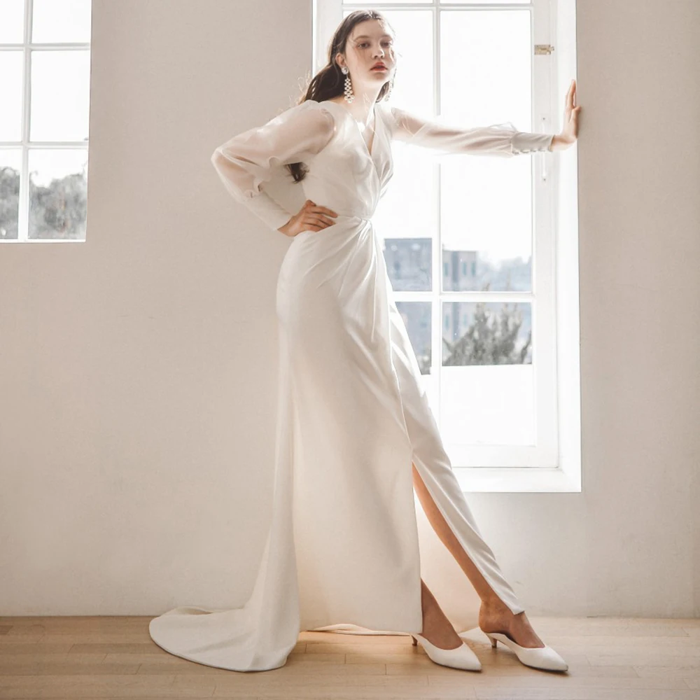 Real Photos Sheath Crepe Ruched Soft Wedding Dress Backless High Slit Simple Long Bishop Sleeves Plus Size V-Neck Bridal Gowns
Real Photos Sheath Crepe Ruched Soft Wedding Dress Backless High Slit Simple Long Bishop Sleeves Plus Size V-Neck Bridal Gowns