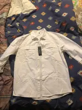 Camisas blancas de manga larga para hombre, camisa negra informal con bolsillos de pecho, 100% algodón, moda coreana, novedad de otoño
