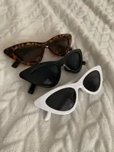 Moda lindo Sexy señoras ojo de gato gafas de sol de las mujeres Vintage Retro pequeño Triangular Cateye gafas Mujer al aire libre gafas