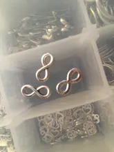 50 Uds. De abalorios de eslabones Infinity, conectores con forma de símbolo de 12x5mm, colgantes de Color plateado Bronce Antiguo, joyería tibetana