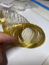 Lote de 100 unidades de cuentas de alambre de acero con memoria de 0,6mm, accesorios para fabricación de pulseras