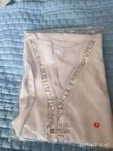 Blusa holgada informal con manga larga para verano, camisa moda de Hirigin con cuello en V para mujer, con lentejuelas, ropa suave