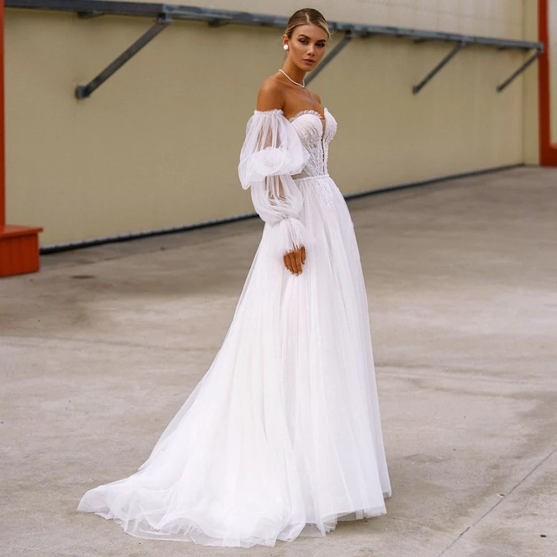 Charming Tulle A-line Bridal Gowns 2020 Sexy Strapless Beading Applique Sweep Train Bohemia Wedding Dress with Lantern Sleeve
Charming Tulle A-line Bridal Gowns 2020 Sexy Strapless Beading Applique Sweep Train Bohemia Wedding Dress with Lantern Sleeve