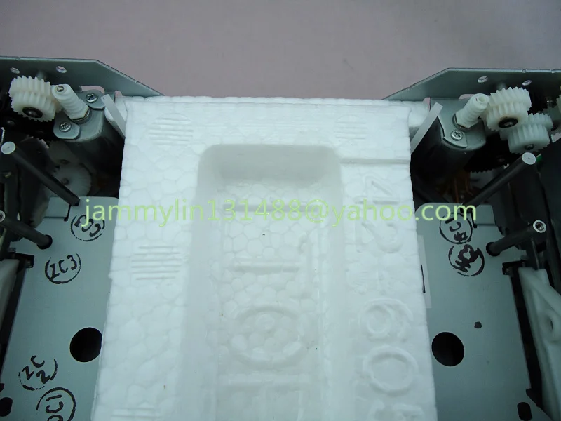 Fujitsu ten 6-Disc CD changer mechanism two motor (2).jpg