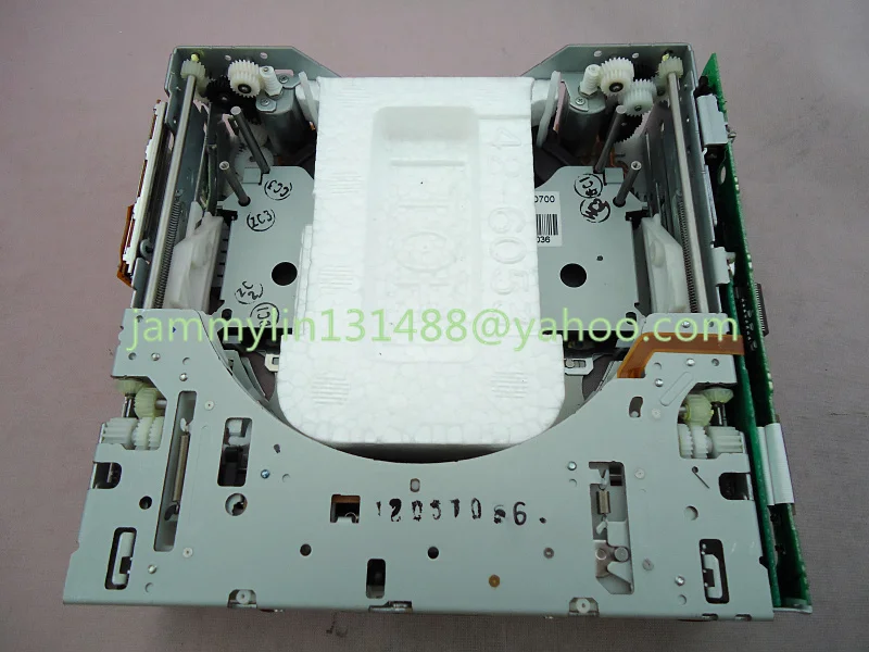 Fujitsu ten 6-Disc CD changer mechanism two motor (1).jpg