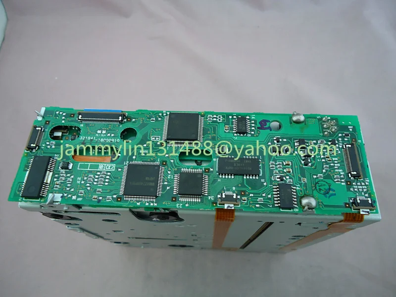 Fujitsu ten 6-Disc CD changer mechanism two motor (3).jpg