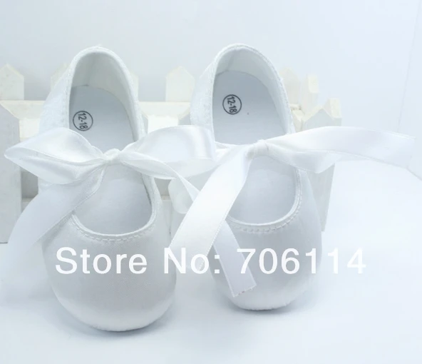 white satin baby shoes