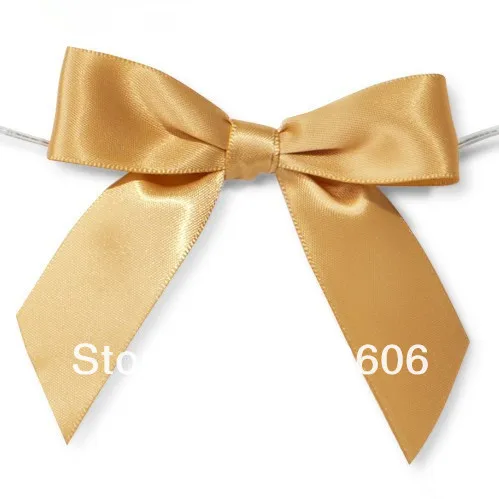 gold ribbon bow for gift wrap.jpg