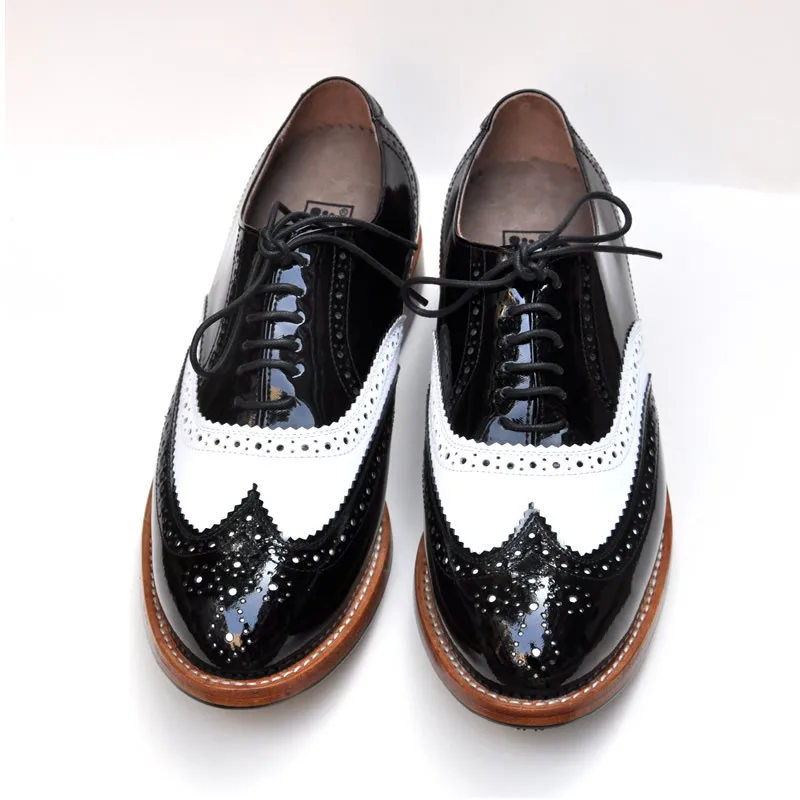 black white golf shoes