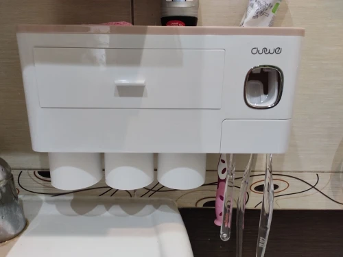 Toothbrush Holder with Toothpaste Dispenser, Cups & Storage photo review