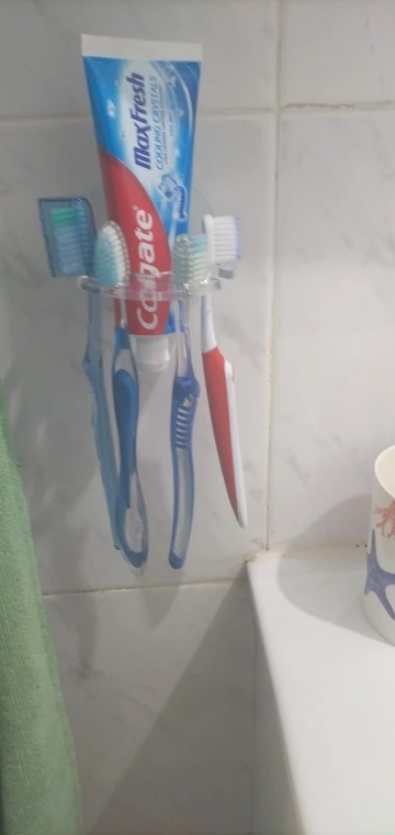 Toothbrush Hanger with Toothpaste Dispenser photo review