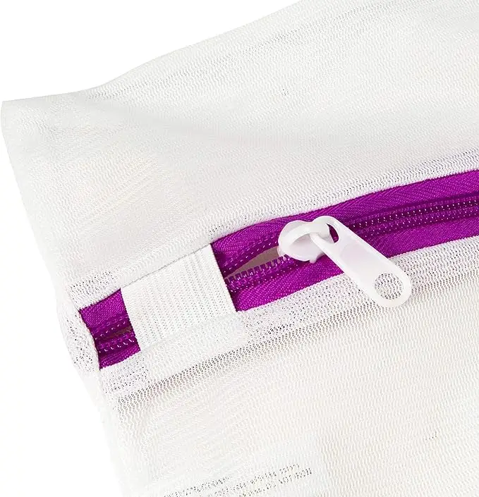 3-piece sanitized mesh wash bag set. Protects delicates during laundry. Durable and functional for gentle cleaning. 6