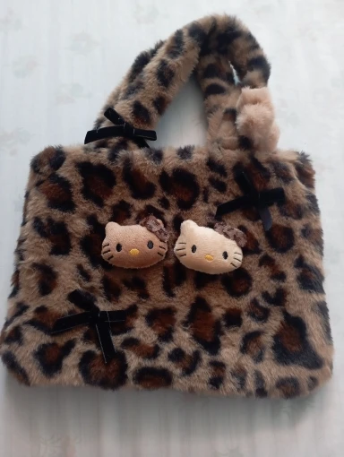 Sanrio-Bolso de mano de felpa Kawaii HelloKitty, bolso de viaje de peluche suave, bolso de felpa portátil, mochila, regalo de Navidad para amigos photo review