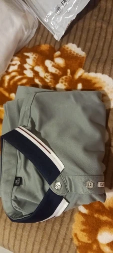 Urban Chic Men's Polo Shirt: Sleek Grey with Classic Striped Trim Detail photo review