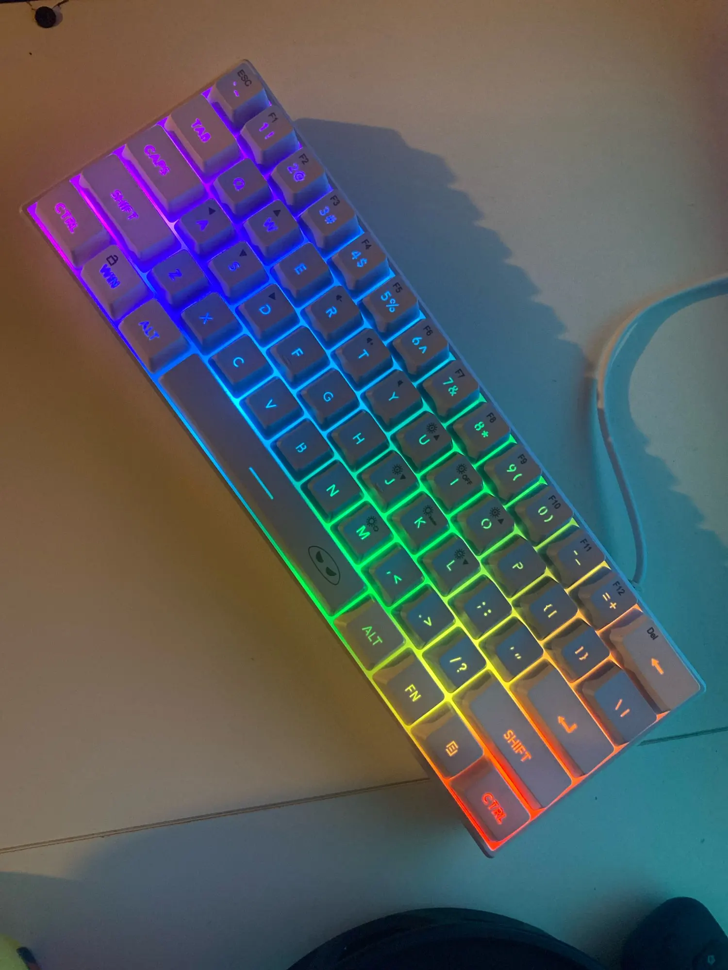 MageGee Mini 60% Gaming Keyboard, RGB Backlit 61 Key Ultra-Compact Keyboard, TS91 Ergonomic Waterproof Mechanical Feeling Office photo review