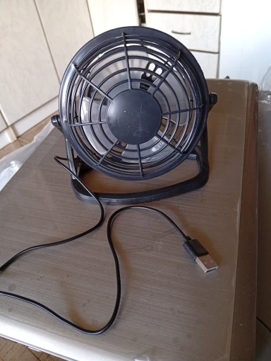 Silent USB Desk Fan 4 Blade Rotatable Mini Cooler photo review
