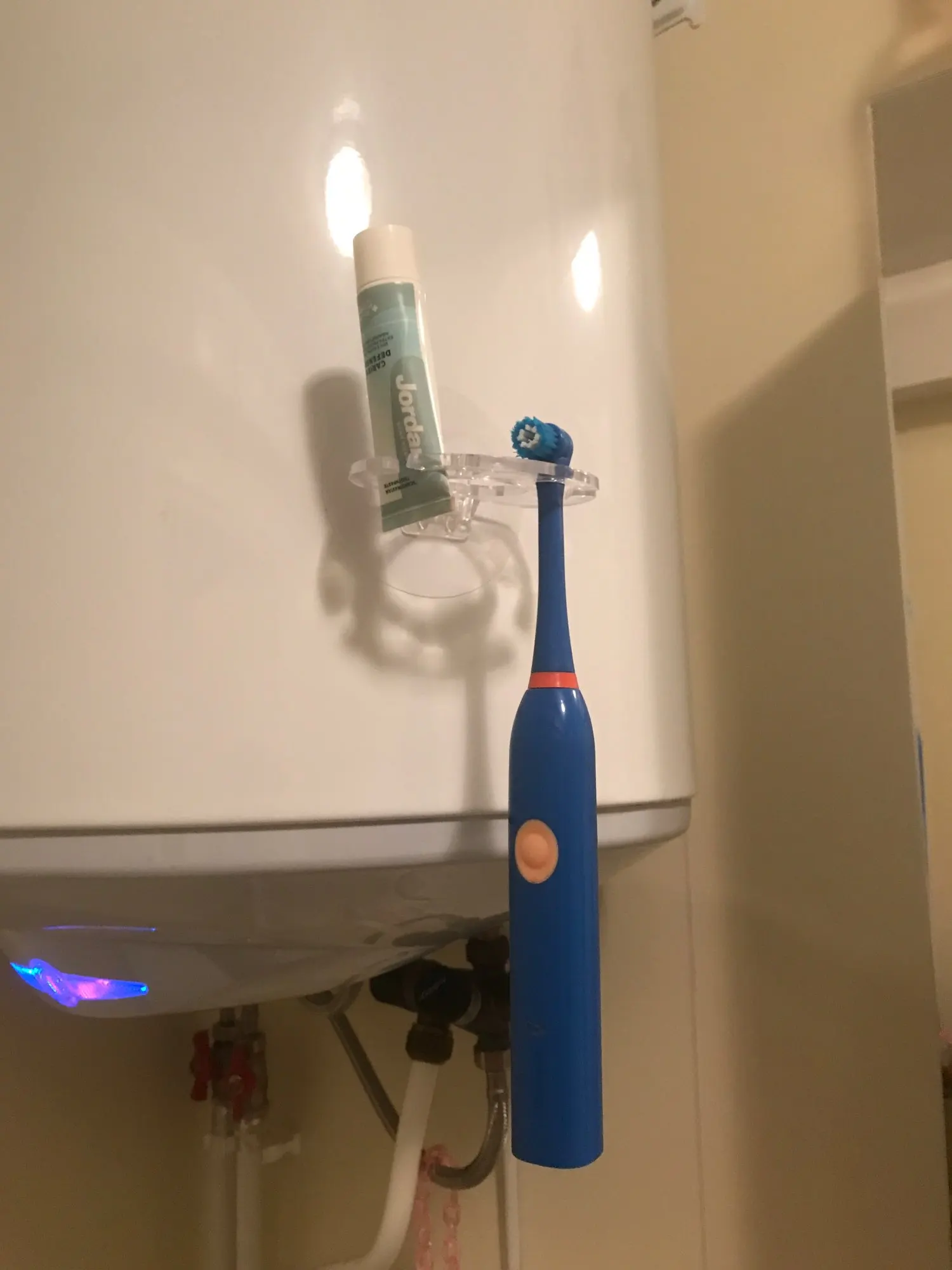 Toothbrush Hanger with Toothpaste Dispenser photo review