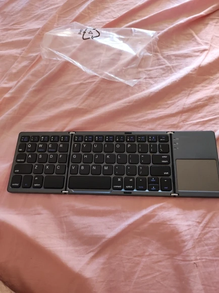 Mini teclado dobrável sem fio bluetooth com touchpad photo review