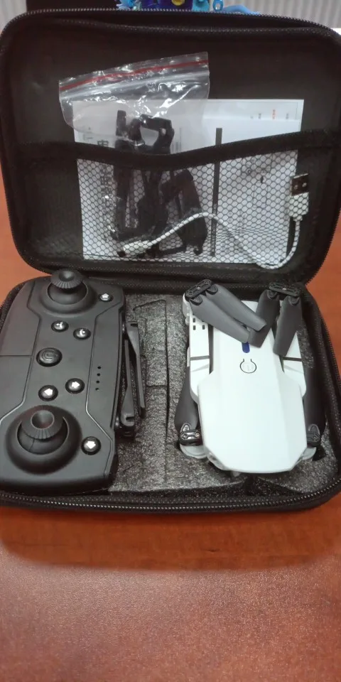 E88 pro RC Drone WIFI FPV with HD 4K Camera Wide Angle View Height Hold Function Foldable Quadcopter Helicopter Toy Gift photo review