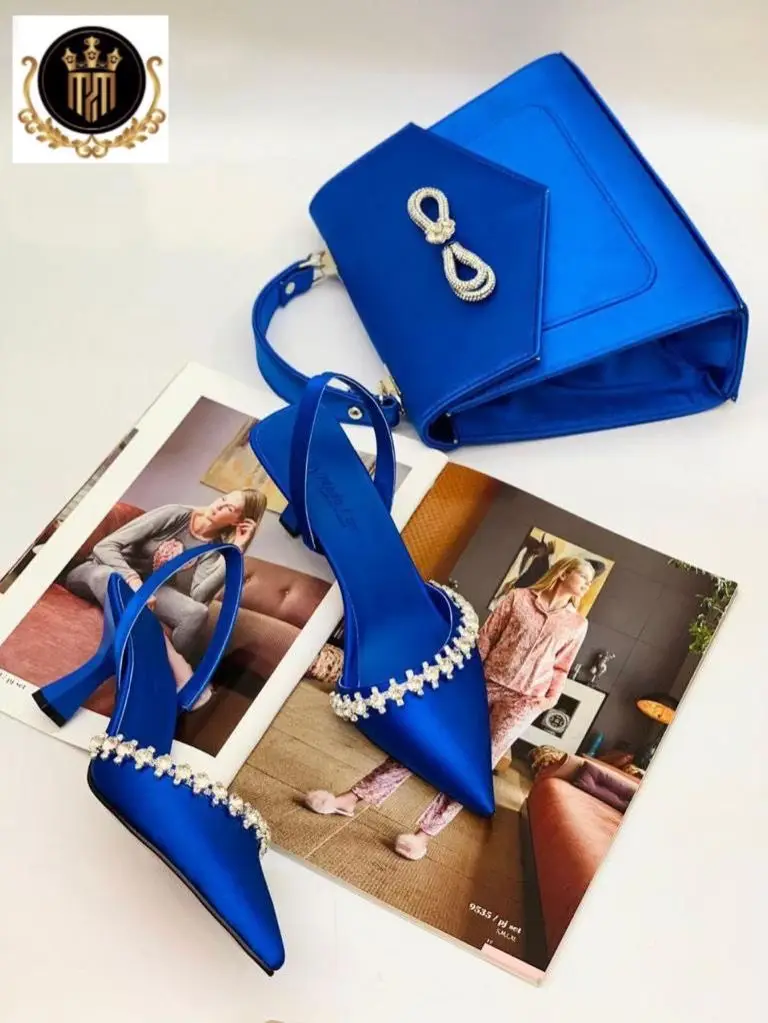 

Miss Melisa Shoe and Bag 2023 model that illuminates the night T139