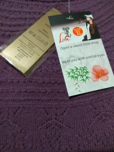 100% Merino Wool Round Neck Hollow Knit Sweater photo review