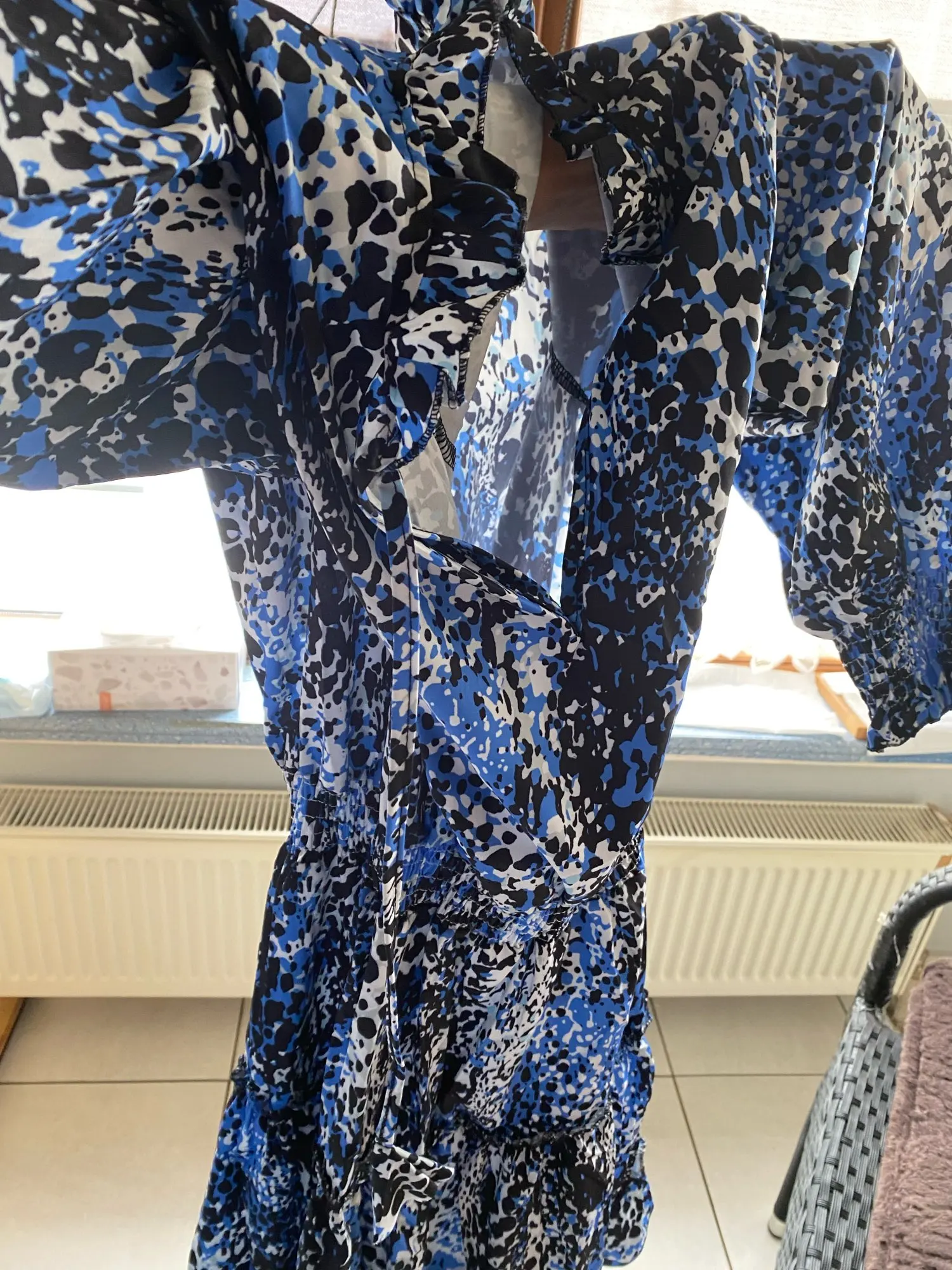 Leopard Print V-Neck Mini Dress with Lace-Up Waist Detail photo review