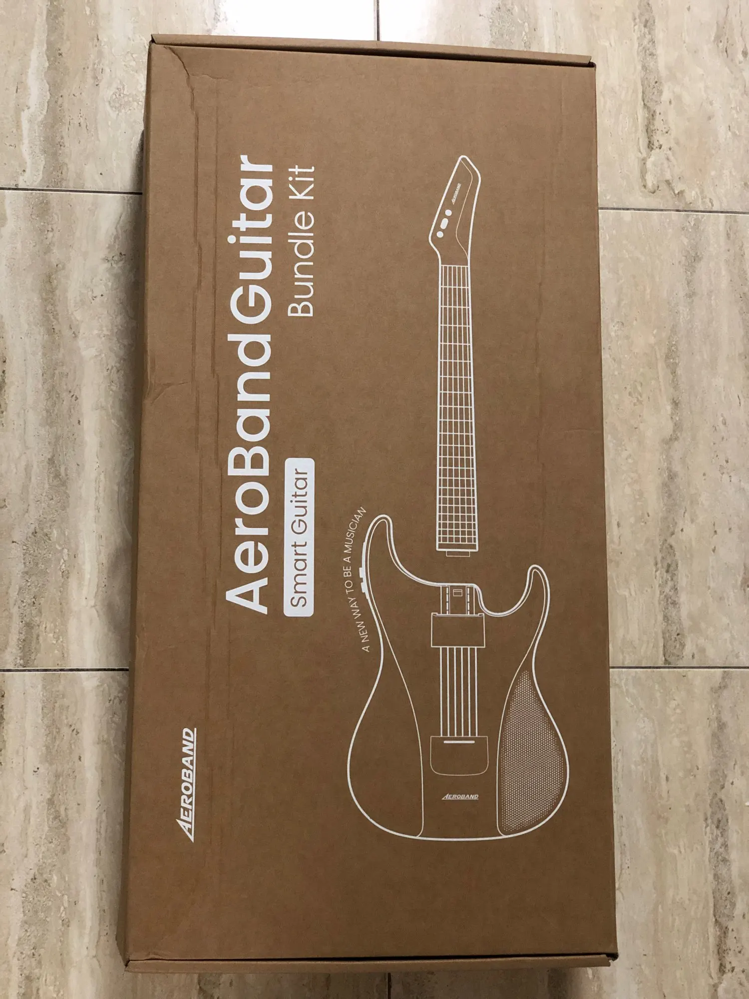 AeroBand Guitar スマートギター バンドルキット Amazon.com: AeroBand Guitar Smart Guitar With Silicone Strings