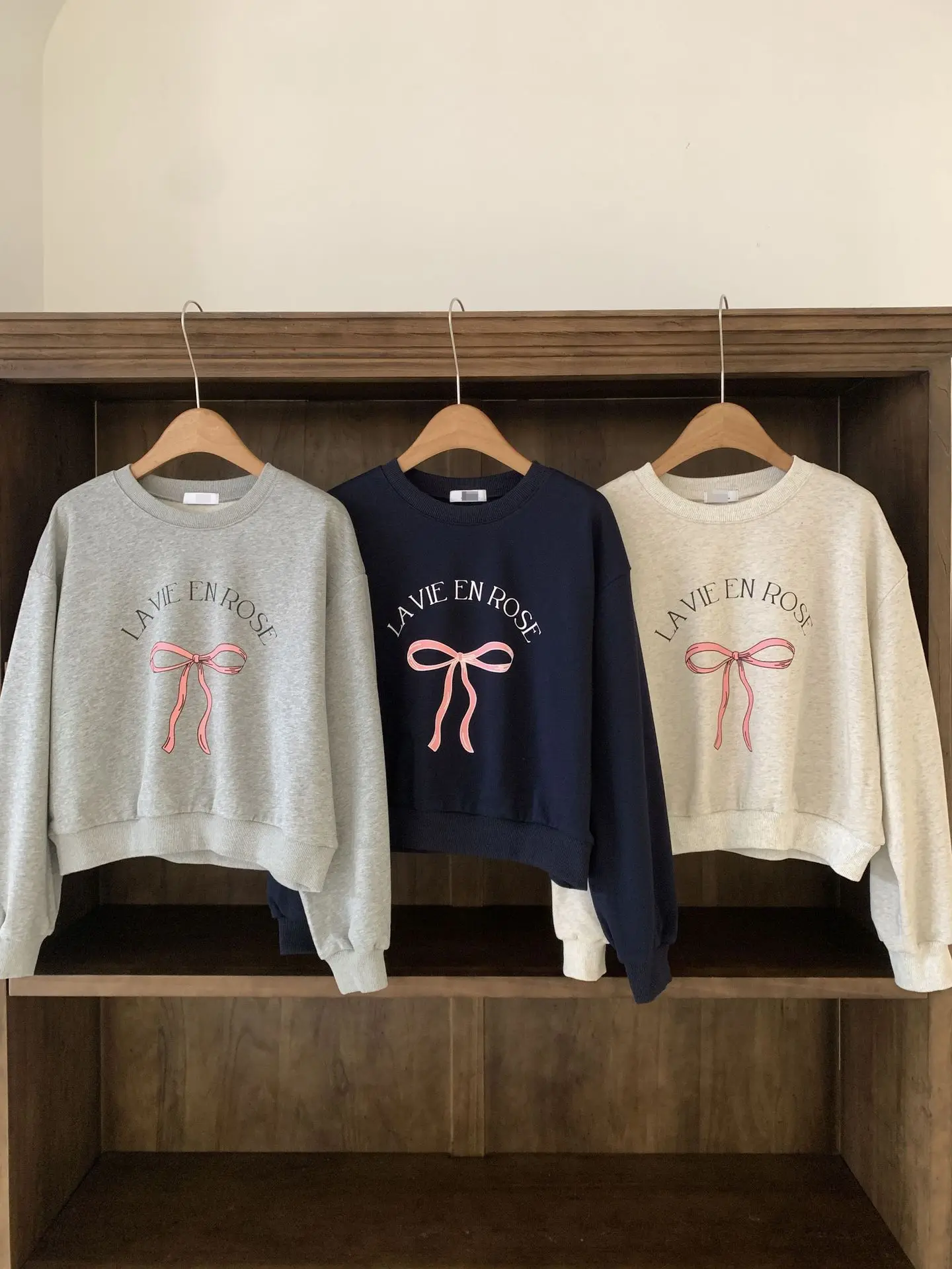 H121 Loose Ribbon Man-to-Man Long-sleeved Round T-Shirt Ribbon Point