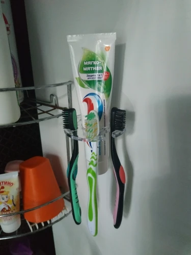 Toothbrush Hanger with Toothpaste Dispenser photo review