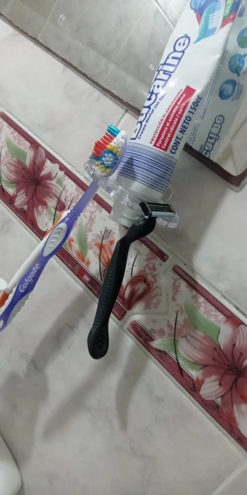 Toothbrush Hanger with Toothpaste Dispenser photo review