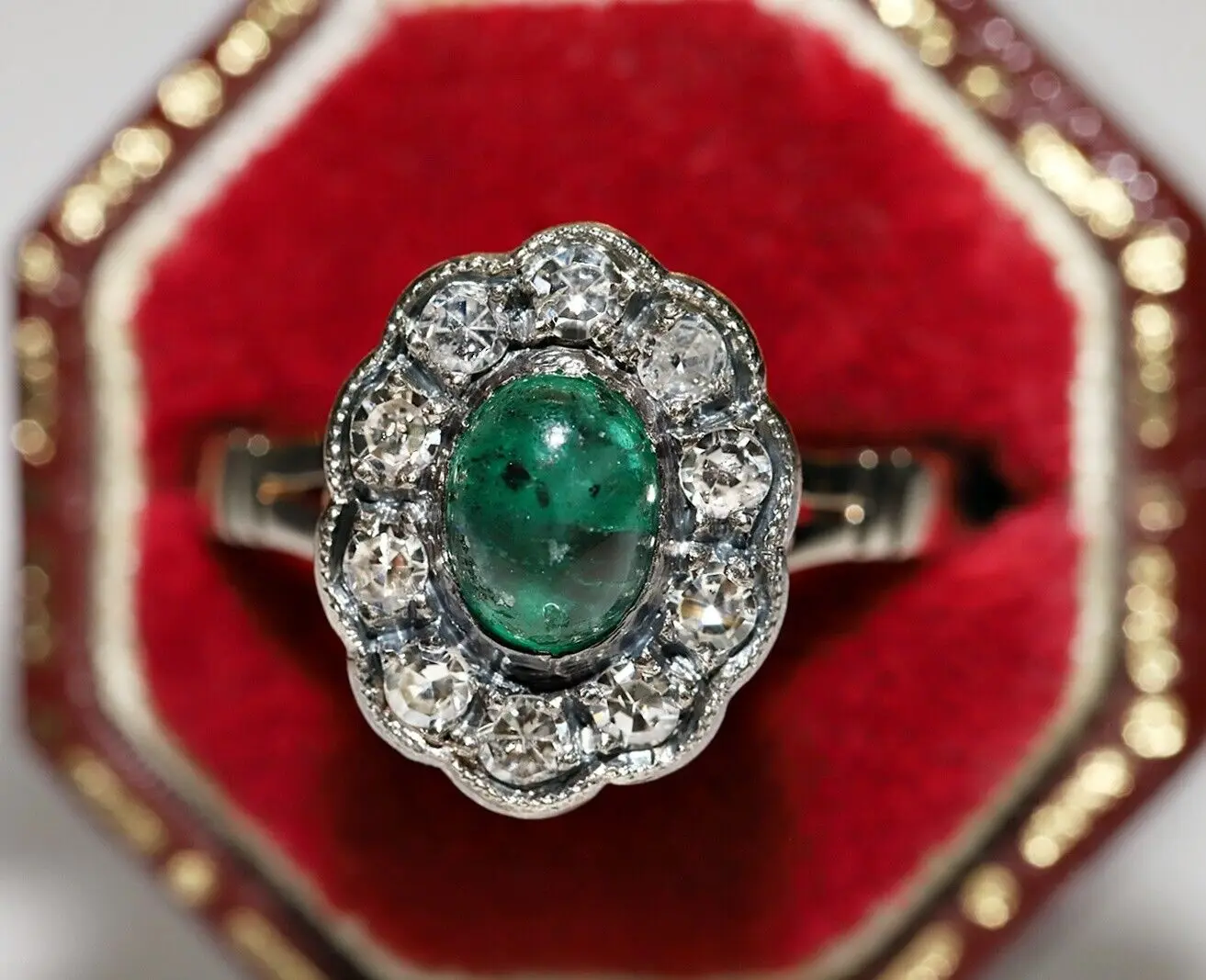

ANTIQUE 1900S 18K GOLD TOP SILVER NATURAL DIAMOND AND CABOCHON EMERALD RING