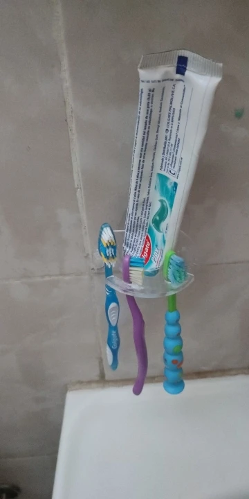 Toothbrush Hanger with Toothpaste Dispenser photo review
