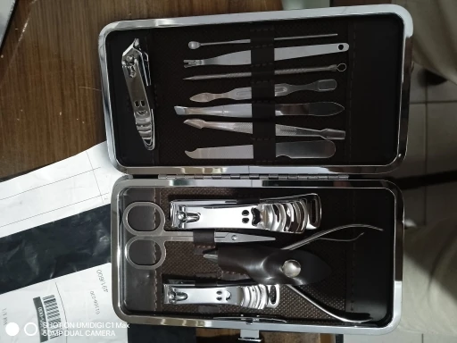 Kit Cortador De Unha Manicure Portatil Estojo Pinca Tesoura photo review