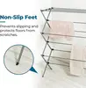 Collapsible silver drying rack with 50lb capacity. Sturdy steel, foldable for indoor/outdoor use. Space-saving and portable. 4