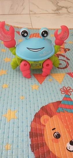 Brinquedo Caranguejo Fujão Musical Som Luz E Movimento photo review