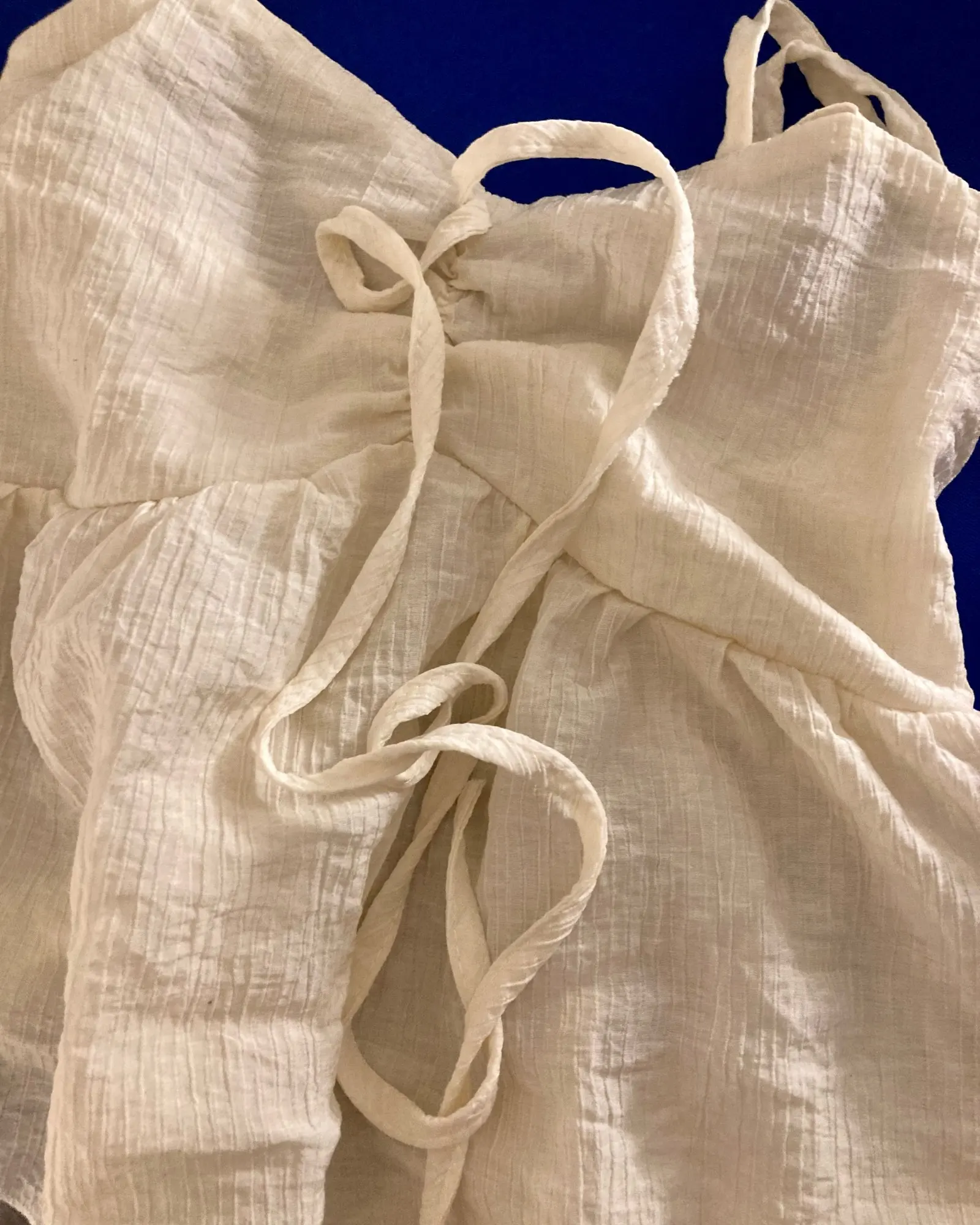 Elegant Linen Blend Babydoll Crop Top with Ruffle Details photo review