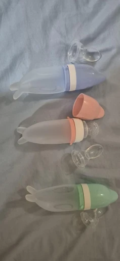 Silicone Dolphin Baby Feeding Bottle - Rice Cereal Spoon and Newborn Tableware photo review