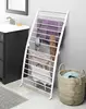 Compact white drying rack, 6"L x 26"W x 51.5"H. Freestanding and foldable for space-saving indoor use. 3