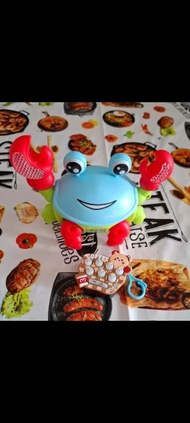 Brinquedo Caranguejo Fujão Musical Som Luz E Movimento photo review