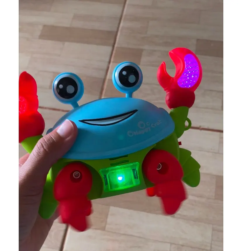 Brinquedo Caranguejo Fujão Musical Som Luz E Movimento photo review