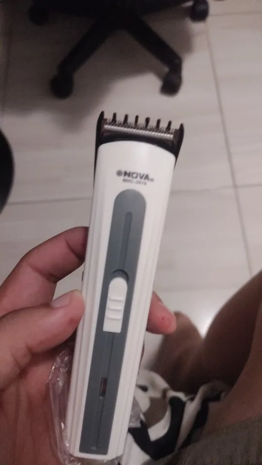 Máquininha De Cortar Cabelo e/ou Barbeador Portátil Aparador Barba 3915 bivolt Recarregável-ENVIO IMEDIATO PARA TODO BRASIL photo review