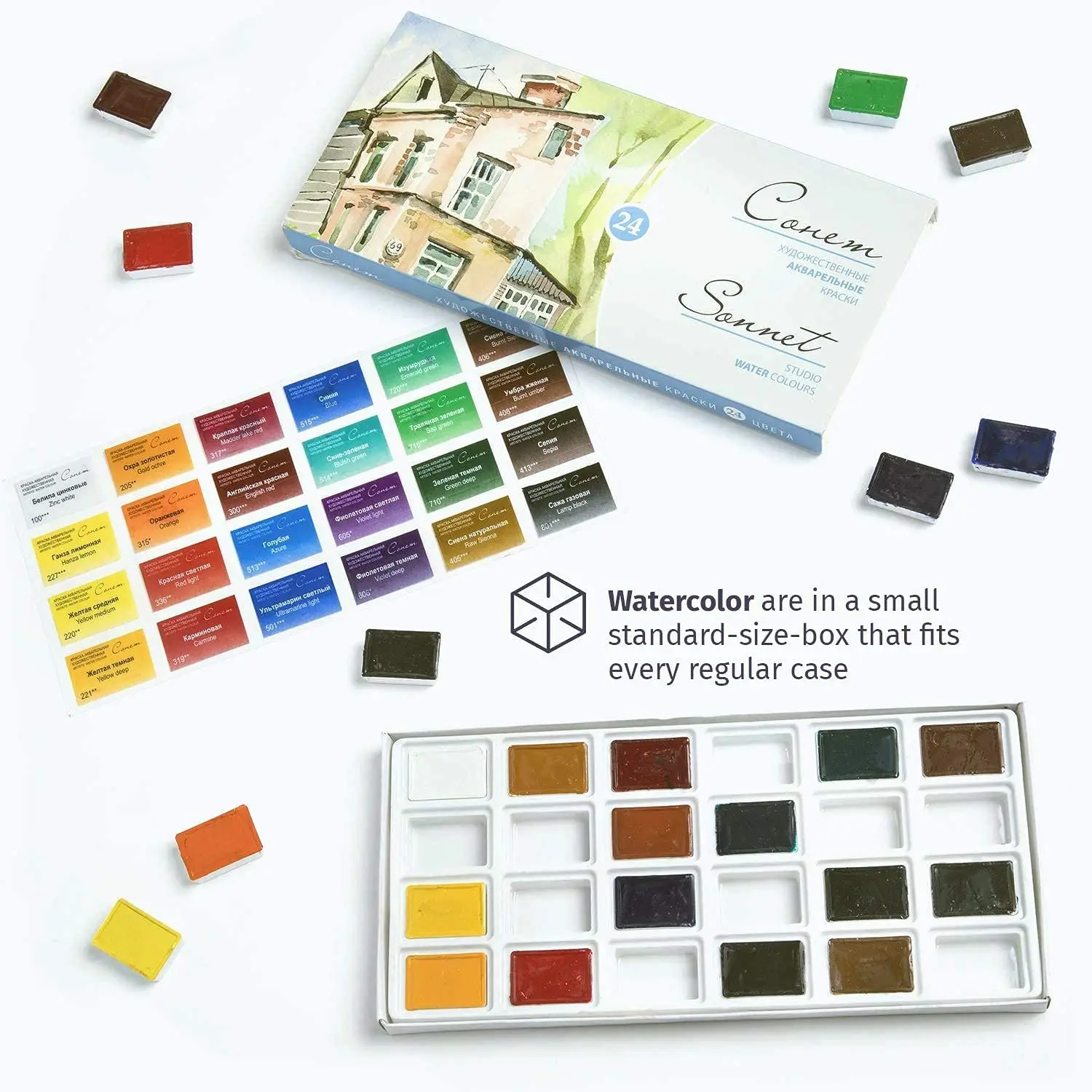 Uspořádané uspořádání akvarelových misek uvnitř jejich krabičky