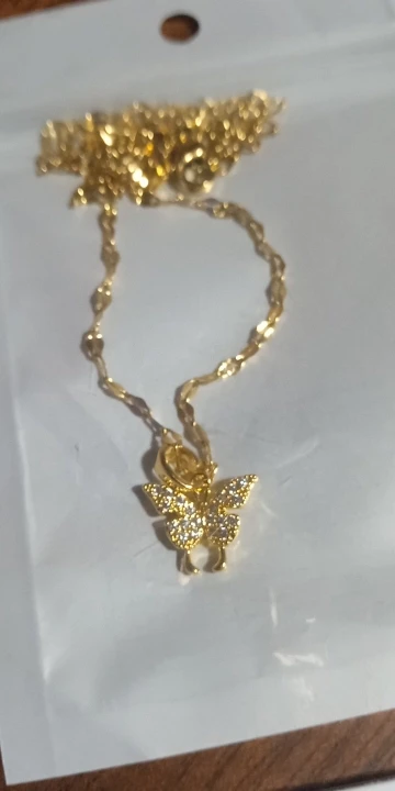 Elevate Your Look: Hollow Knight Necklace with Gold Glamour photo review