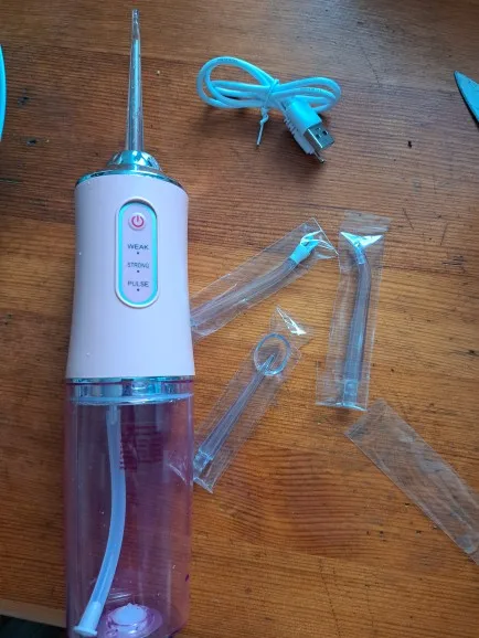 Portable Oral Irrigator | Dental Water Flosser USB Rechargeable photo review