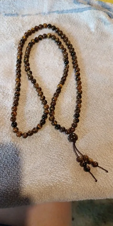 Collier mala tibétain en oeil de tigre - Source Sereine photo review