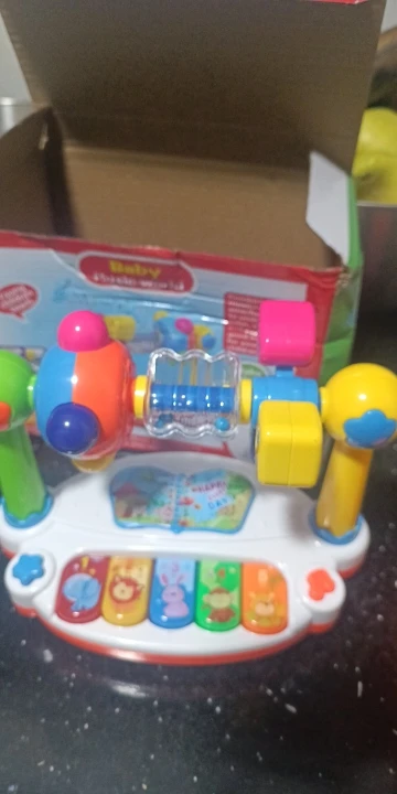 Musical Keyboard Toy Rotating Music Lights Sound for Toddlers, Random Color photo review