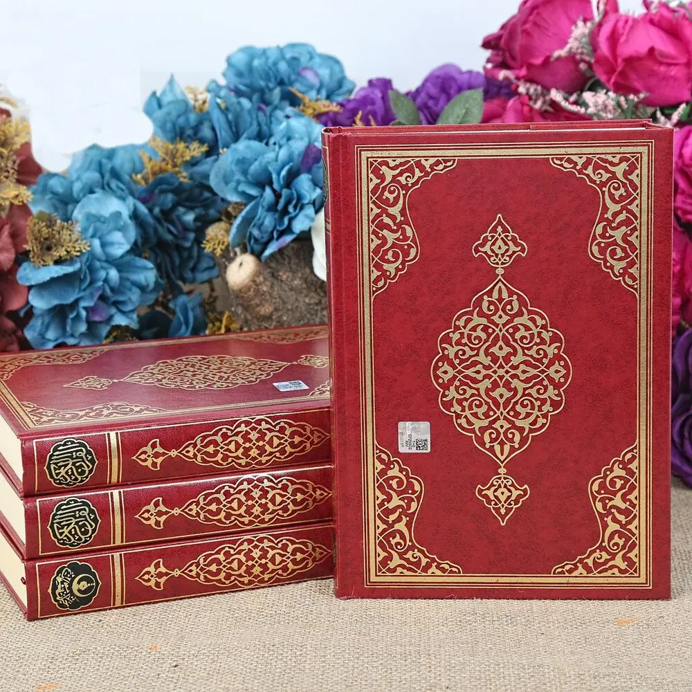 

The Holy Quran with Computer Calligraphy Sealed (Mosque Length 24x35 cm) Claret Red, Blue and Green color.